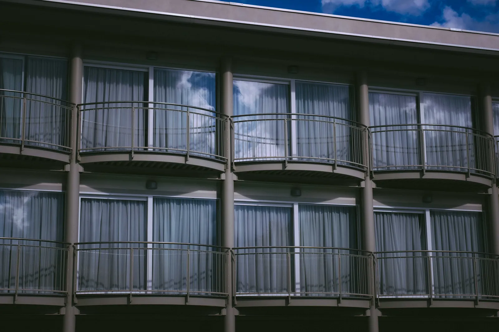 Rows of balconies on a waterfront building